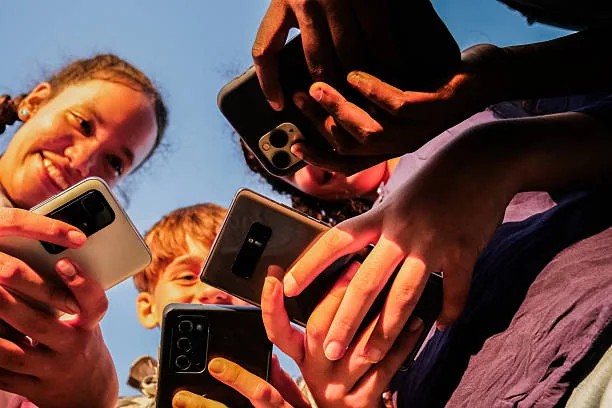 Children on cell phone.
